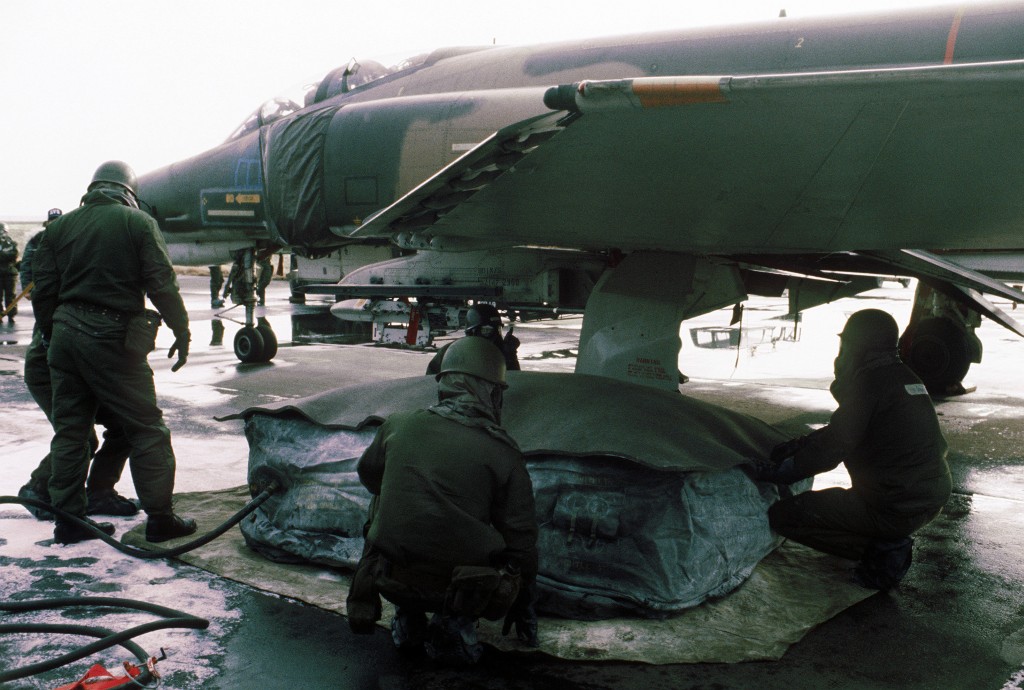 50th Civil Engineering Squadron repair a tire of an F-4E Phantom II at Hahn Air Base