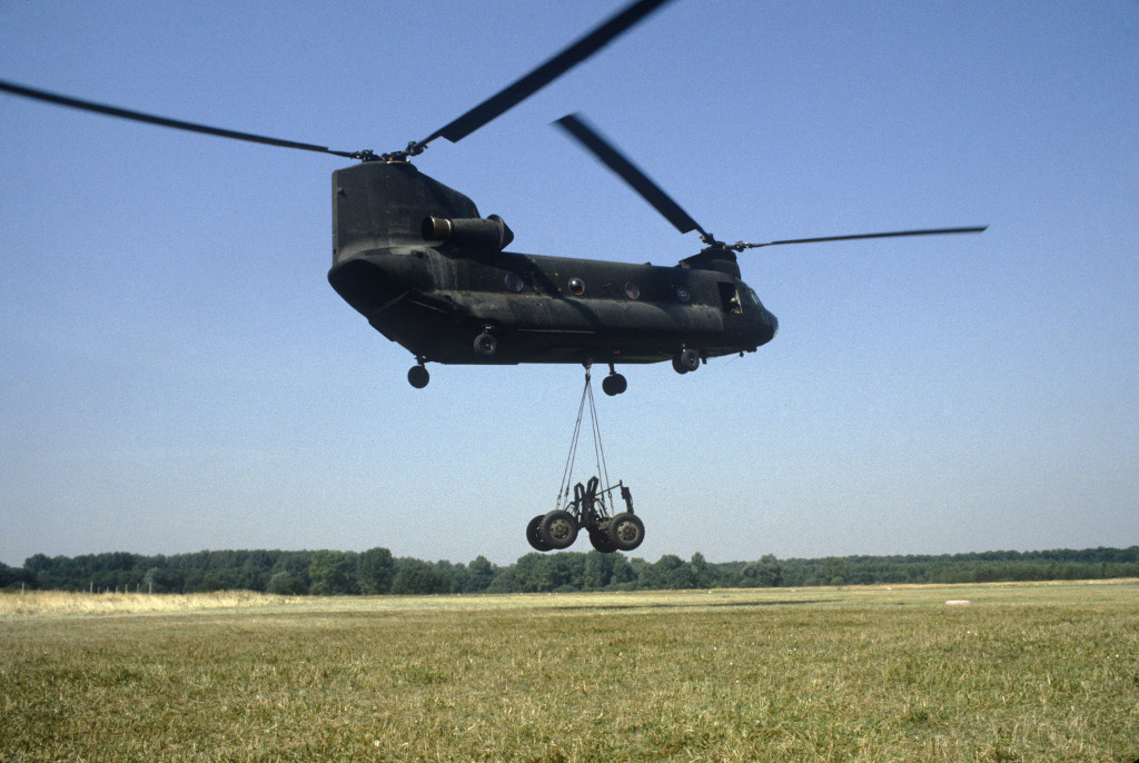 Craig M832 transporter is airlifted by a helicopter CH-47 Chinook