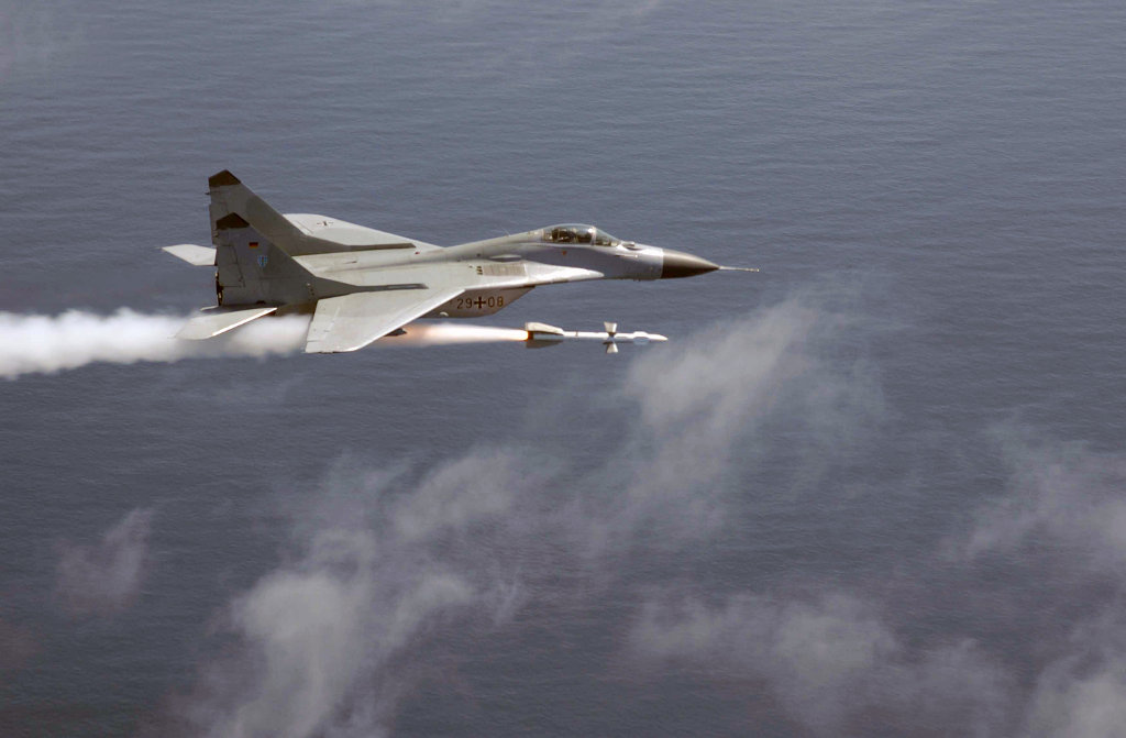 MiG-29 Fulcrum of German Air Force fires a air-to-air missile AA-10 Alamo