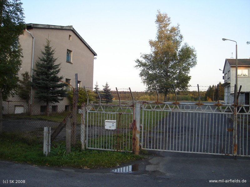 Gate and buildings.
